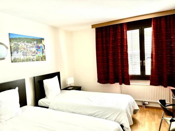 Neuchâtel City Hôtel : photo 1 de la chambre chambre lits jumeaux Économique