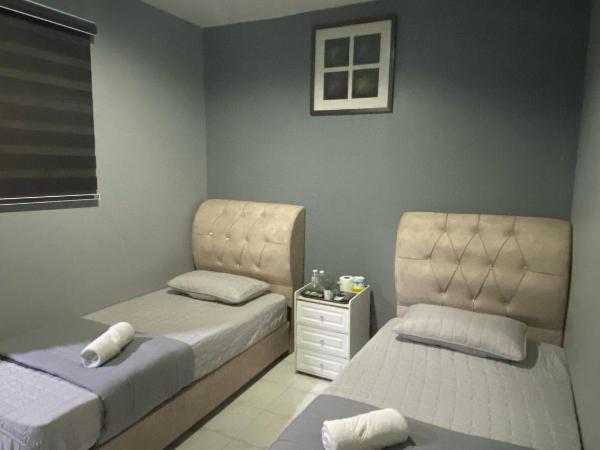 TC Maya Abaya Hotel : photo 1 de la chambre petite chambre double ou lits jumeaux