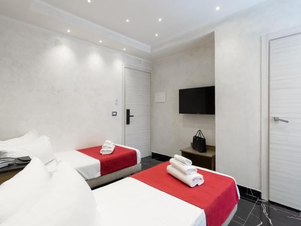 Hotel Bella Napoli : photo 1 de la chambre chambre quadruple
