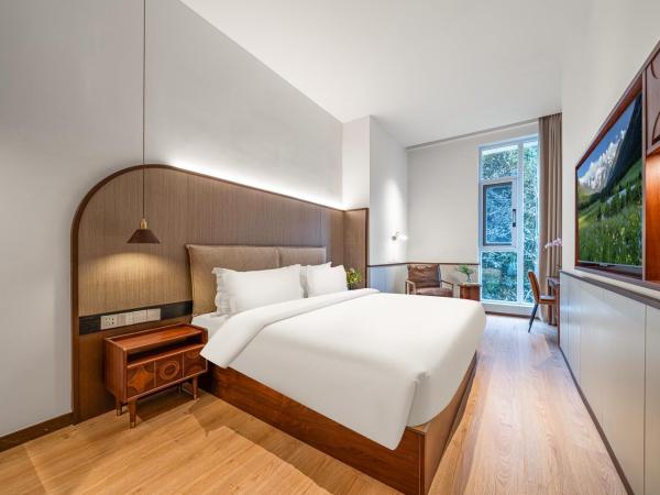 Wuyu Hotel, Jinyun Mountain Store, Southwest University : photo 1 de la chambre chambre lit queen-size - vue sur jardin