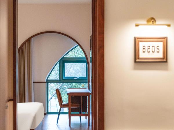 Wuyu Hotel, Jinyun Mountain Store, Southwest University : photo 3 de la chambre chambre lit king-size - vue sur jardin