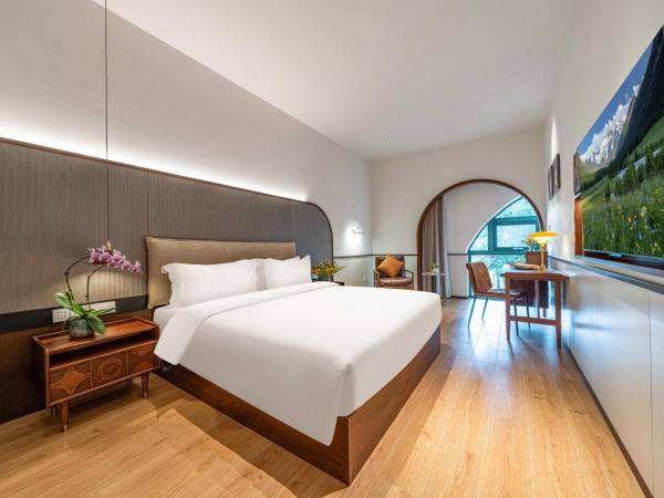 Wuyu Hotel, Jinyun Mountain Store, Southwest University : photo 2 de la chambre chambre lit king-size - vue sur jardin