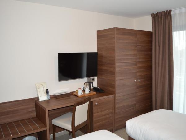 Hotel Port Toga : photo 1 de la chambre chambre double ou lits jumeaux supérieure - vue sur mer