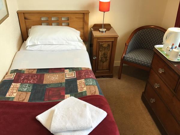 The Royal Crown Guest House : photo 1 de la chambre chambre simple avec toilettes et douche communes