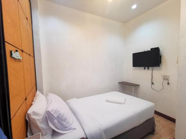 Kan Home Hotel : photo 2 de la chambre chambre simple avec salle de bains privative