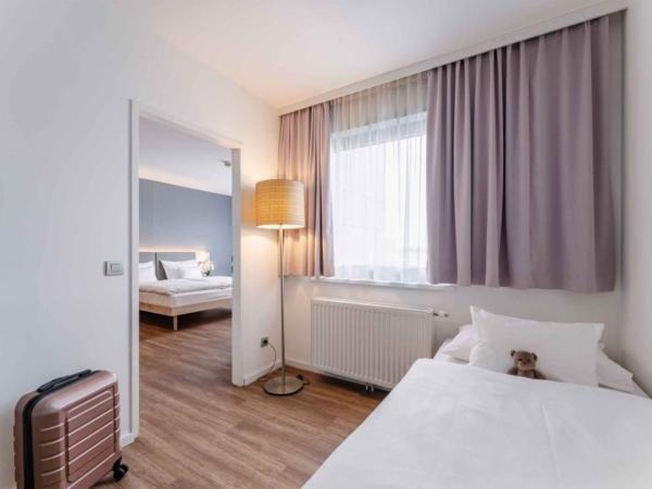 PLAZA INN Wien Gasometer : photo 4 de la chambre chambre familiale