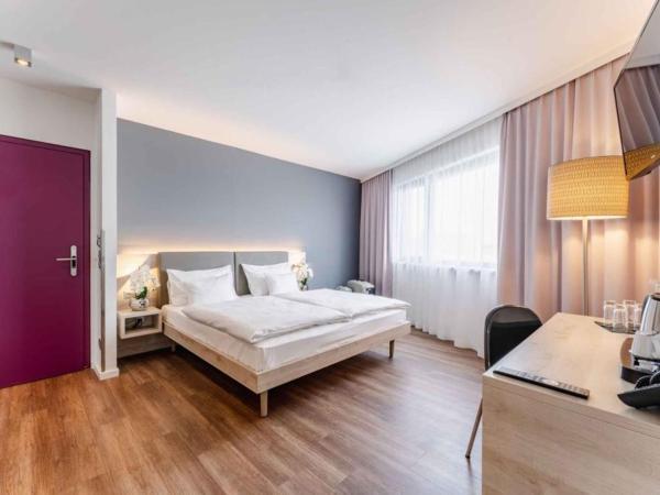 PLAZA INN Wien Gasometer : photo 1 de la chambre chambre familiale