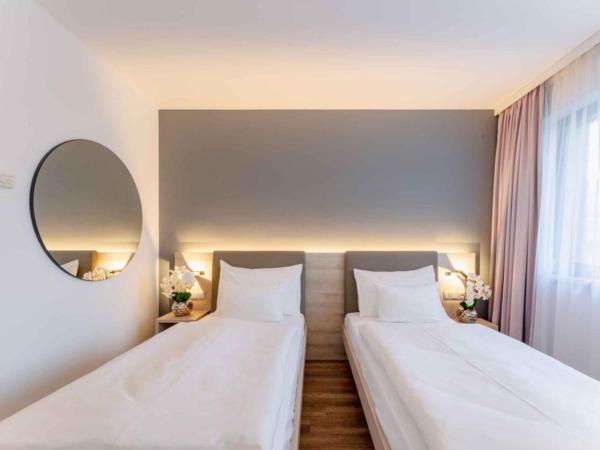 PLAZA INN Wien Gasometer : photo 4 de la chambre chambre lits jumeaux standard