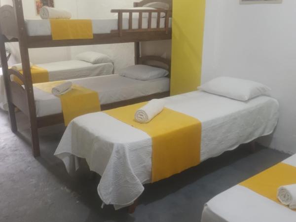 Hostel Palma de Leão : photo 1 de la chambre lit simple dans dortoir pour hommes