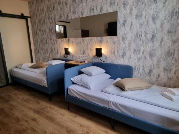 Boutique Hotel & Event Center : photo 9 de la chambre chambre lits jumeaux standard