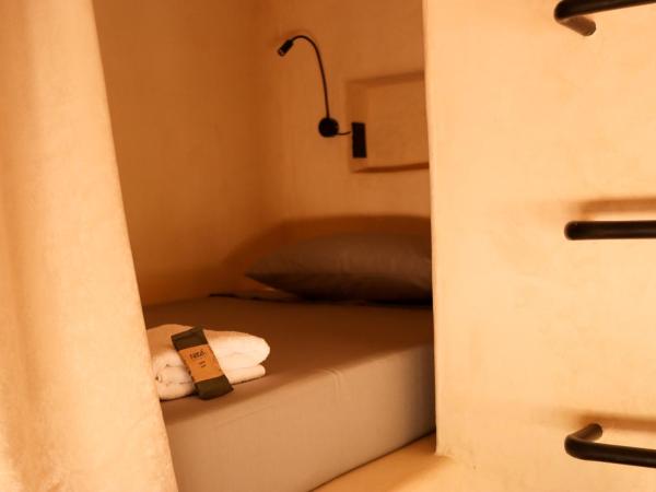 Secret Beach Hostel : photo 3 de la chambre lit simple dans dortoir mixte