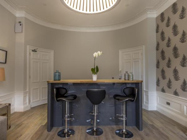 Haymarket Apartments : photo 9 de la chambre suite lit king-size