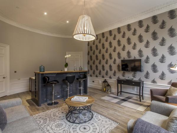 Haymarket Apartments : photo 6 de la chambre suite lit king-size