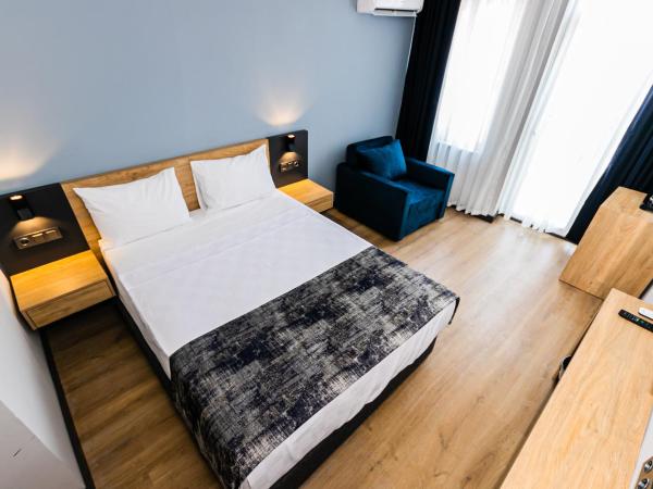 Lara World Hotel : photo 4 de la chambre chambre double ou lits jumeaux