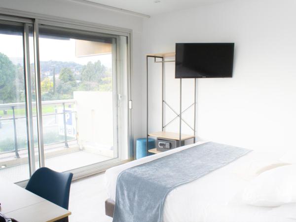 Tiercé Hotel : photo 4 de la chambre comfort double room  with racecourse view