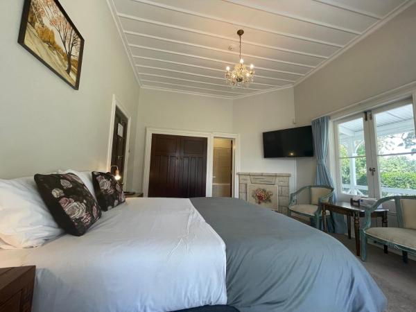 Western Springs Villa to Auckland Central Heritage Villa : photo 4 de la chambre chambre lit king-size