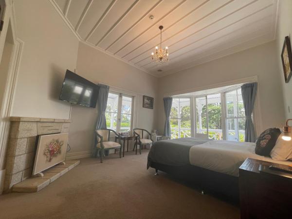 Western Springs Villa to Auckland Central Heritage Villa : photo 5 de la chambre chambre lit king-size