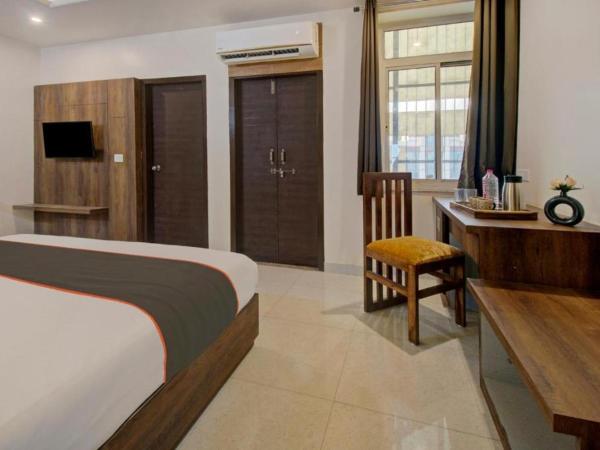 Aravali Inn : photo 2 de la chambre chambre double deluxe (2 adultes + 1 enfant)