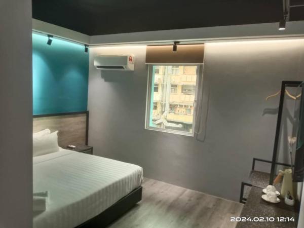 Pantai Inn Kota Kinabalu : photo 2 de la chambre chambre lit king-size deluxe