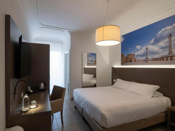 Hotel Delle Palme : photo 6 de la chambre chambre triple supérieure