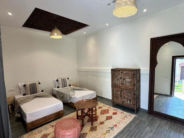 Oasis Merasi Marrakech : photo 1 de la chambre chambre double ou lits jumeaux - vue sur jardin