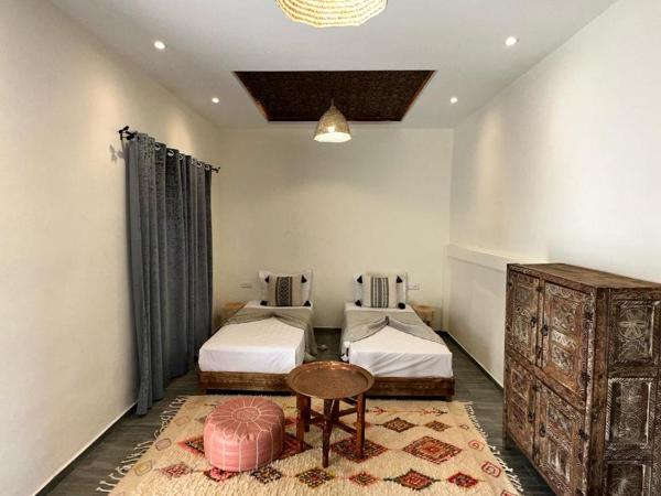 Oasis Merasi Marrakech : photo 3 de la chambre chambre double ou lits jumeaux - vue sur jardin