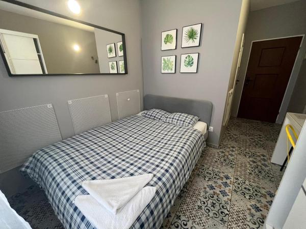 Grey Poznań Pokój z łazienką , Darmowy parking, Zameldowanie Bezobsługowe : photo 1 de la chambre chambre double avec salle de bains privative