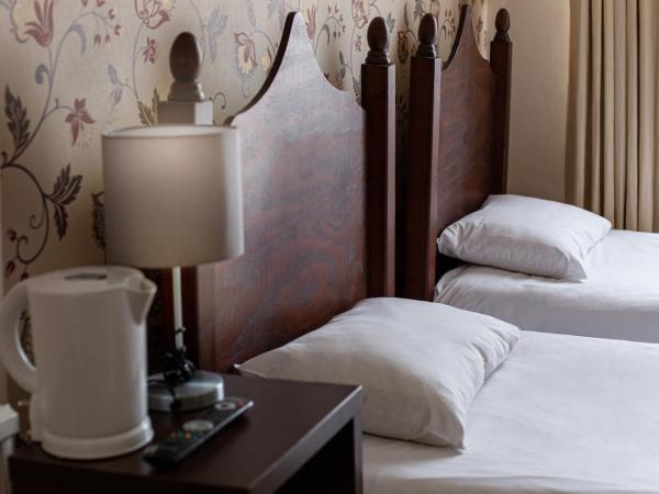 Islington Inn : photo 2 de la chambre chambre lits jumeaux