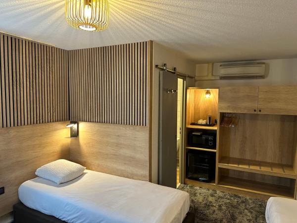 Ostal Pau Universite - Sure Hotel Collection by Best Western : photo 1 de la chambre chambre familiale avec 1 lit queen-size et 2 lits simples