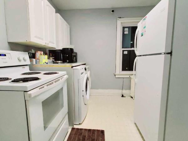 Merj's Guest House in Wolesly : photo 8 de la chambre chambre lit queen-size deluxe