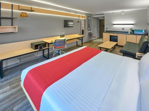 City Express Plus by Marriott Guadalajara Palomar : photo 3 de la chambre chambre lit queen-size supérieure avec canapé-lit