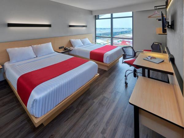 City Express Plus by Marriott Guadalajara Palomar : photo 6 de la chambre chambre double avec 2 lits doubles