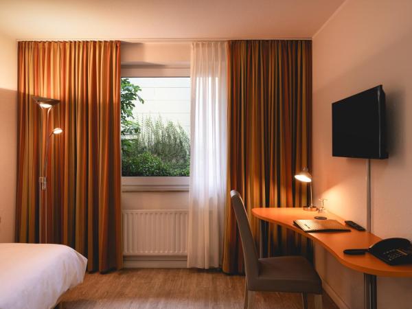 Hotel Astra : photo 4 de la chambre single room basement floor