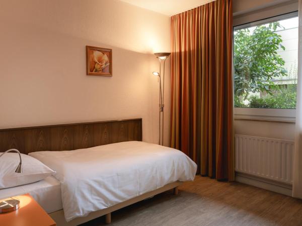 Hotel Astra : photo 3 de la chambre single room basement floor