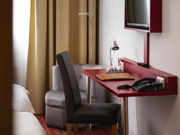 Hotel Astra : photo 4 de la chambre chambre lits jumeaux