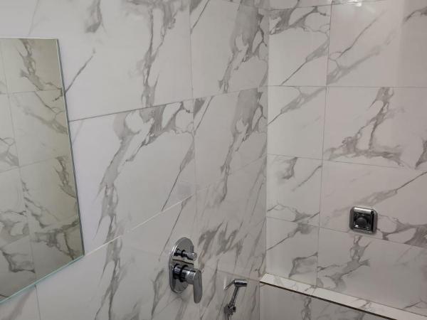 Galaxy Cabin Stay And Dormitory : photo 10 de la chambre lit simple dans dortoir pour hommes avec salle de bains commune