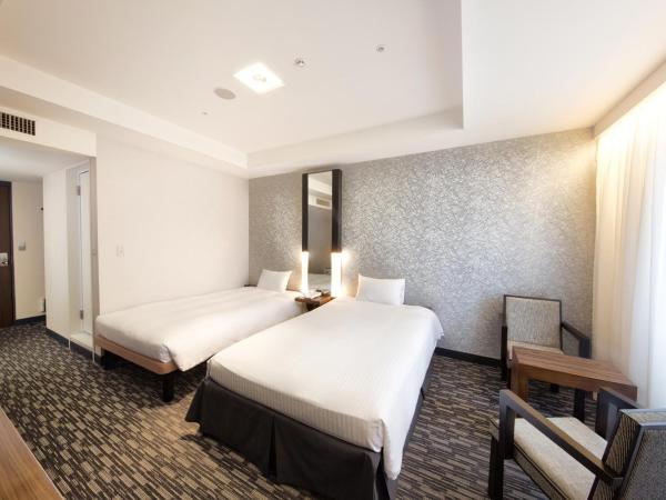 Kokusai 21 International Hotel : photo 2 de la chambre chambre lits jumeaux Économique
