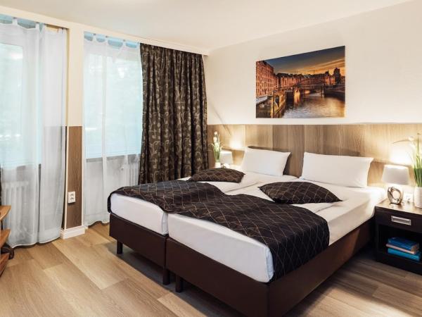 Hotel Hanseat Hamburg : photo 1 de la chambre chambre double avec salle de bains privative extérieure