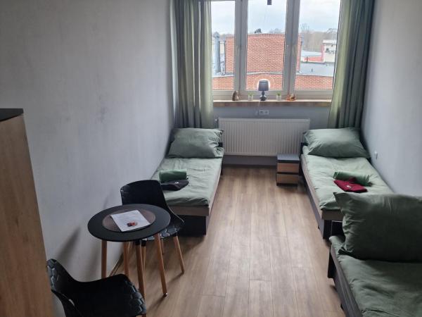 CZARNA PERŁA : photo 2 de la chambre chambre triple basique avec salle de bains commune