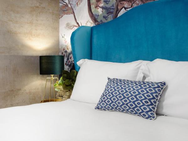 Hotel Los Girasoles : photo 3 de la chambre suite