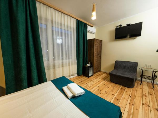 Elegant Apartments : photo 5 de la chambre chambre triple classique