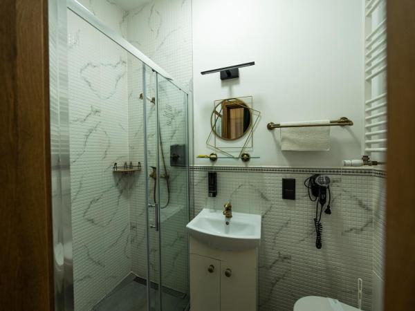 Elegant Apartments : photo 10 de la chambre chambre triple classique