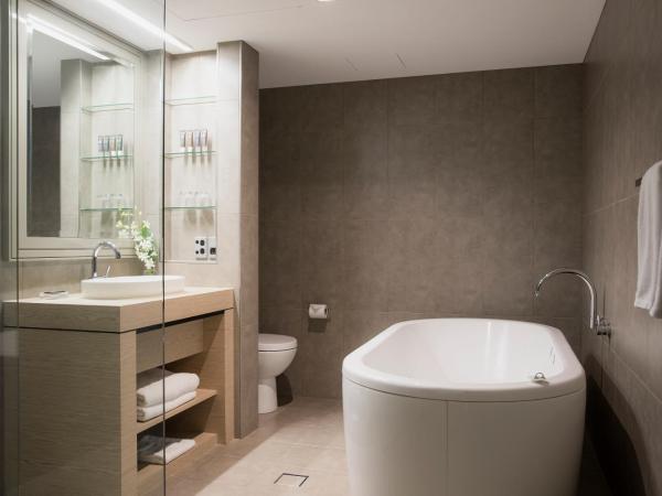 Novotel Melbourne On Collins : photo 2 de la chambre deluxe spa room one king bed