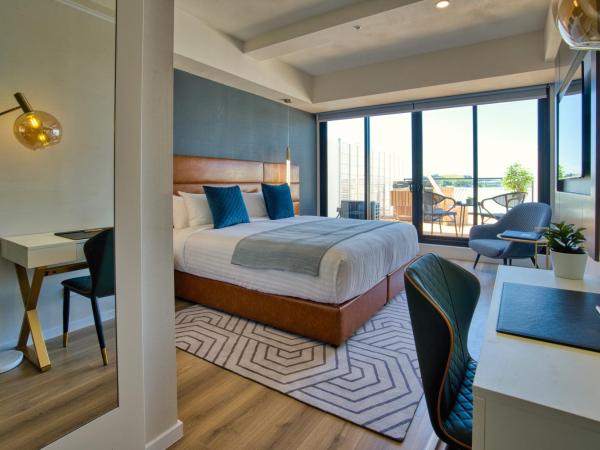 SOHO Hotel Auckland : photo 1 de la chambre suite avec jacuzzi