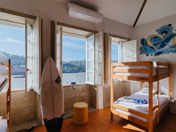 Happy Porto Hostel & Apartments : photo 2 de la chambre lit dans dortoir mixte de 12 lits