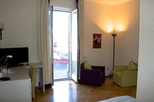 Residence gli Angioini srl : photo 5 de la chambre chambre quadruple classique