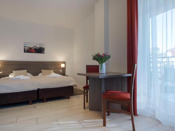 MariSol : photo 9 de la chambre chambre quadruple