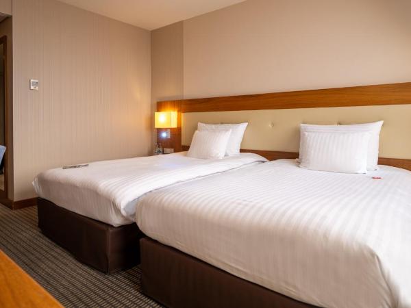 Mövenpick Hotel Geneva : photo 4 de la chambre chambre lits jumeaux deluxe