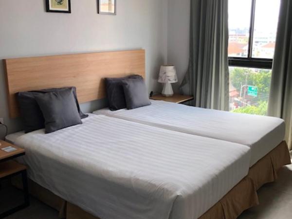 Vogue Pattaya Hotel : photo 4 de la chambre chambre lits jumeaux