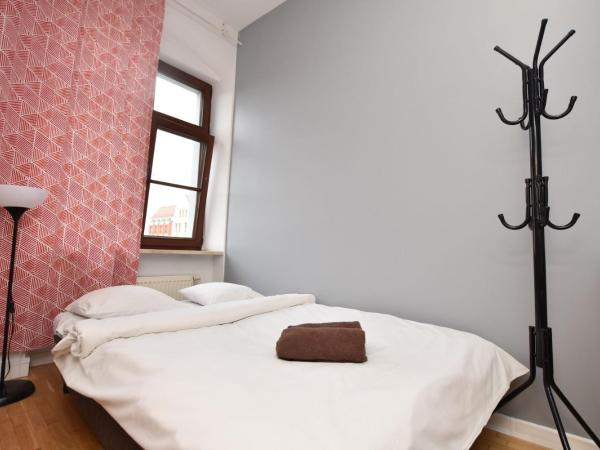 City Central Hostel - Pokoje prywatne : photo 1 de la chambre chambre familiale avec salle de bains commune